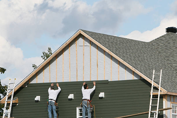 Professional Siding Replacement technician working in Oldtown, MD